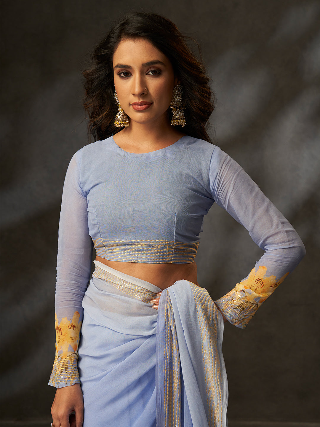 The delicate floral print combined with a subtle shimmering border