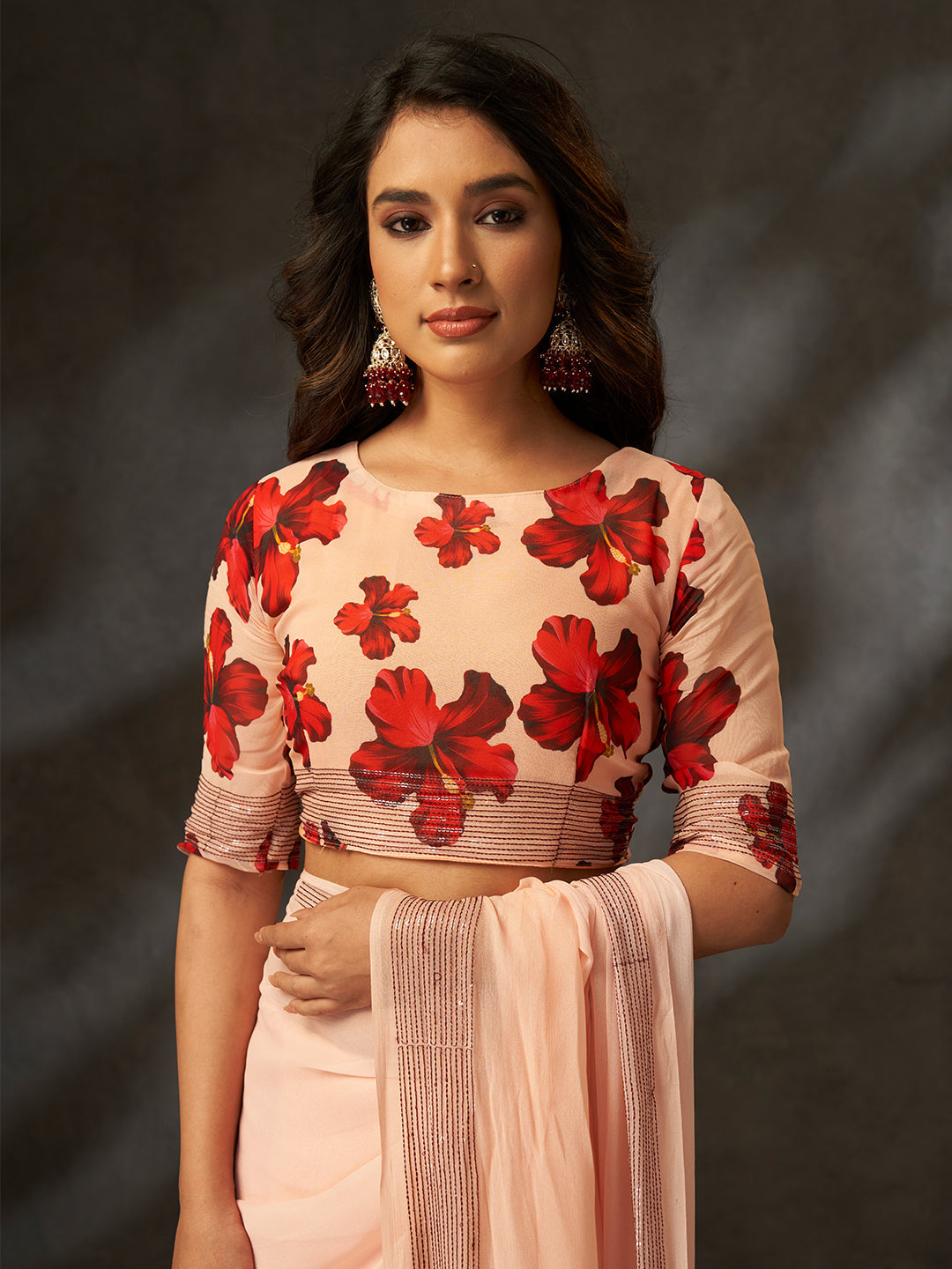 The delicate floral print combined with a subtle shimmering border