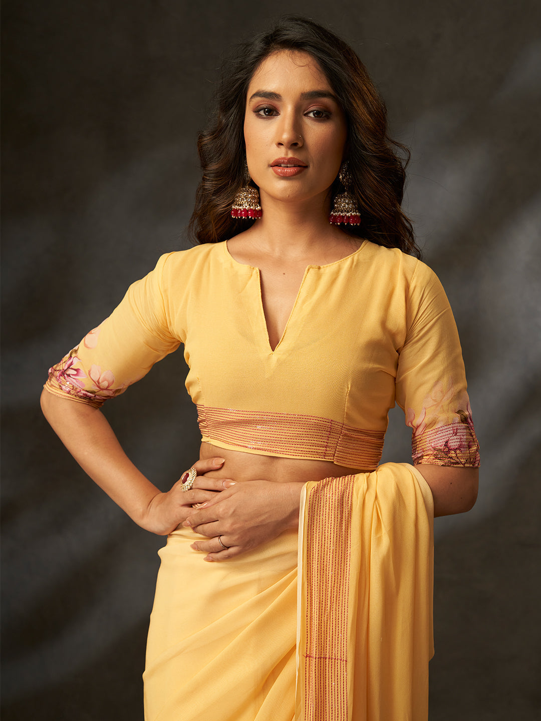 The delicate floral print combined with a subtle shimmering border