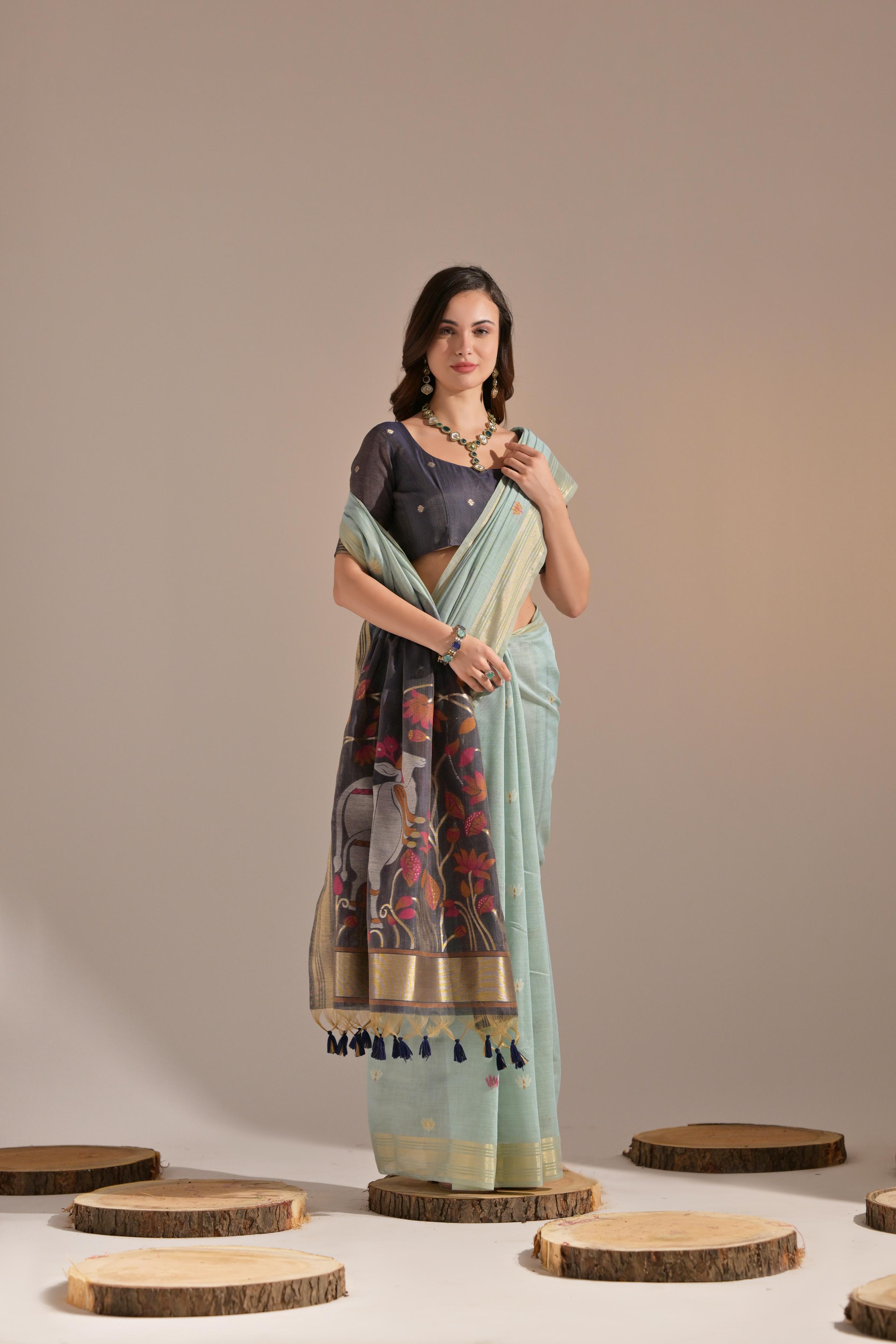 Bright-  motifs woven design saree with woven design border muga saree
