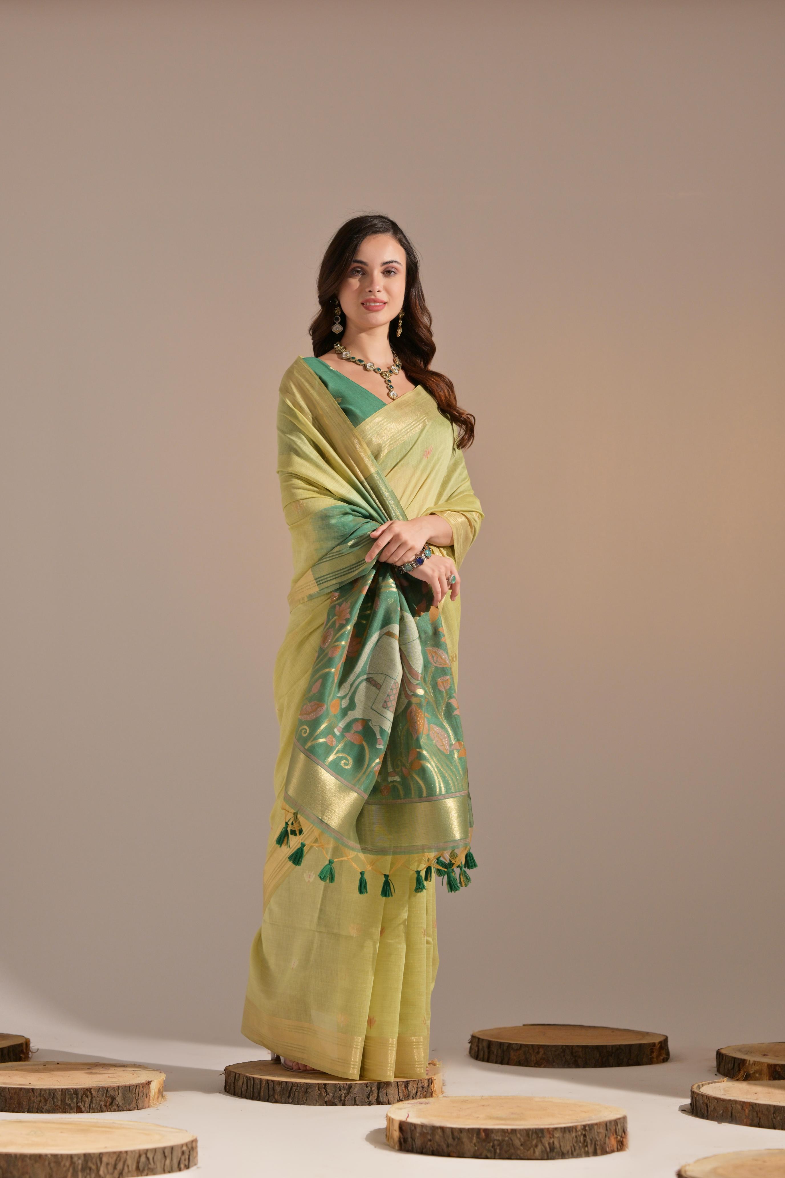 Bright-  motifs woven design saree with woven design border muga saree