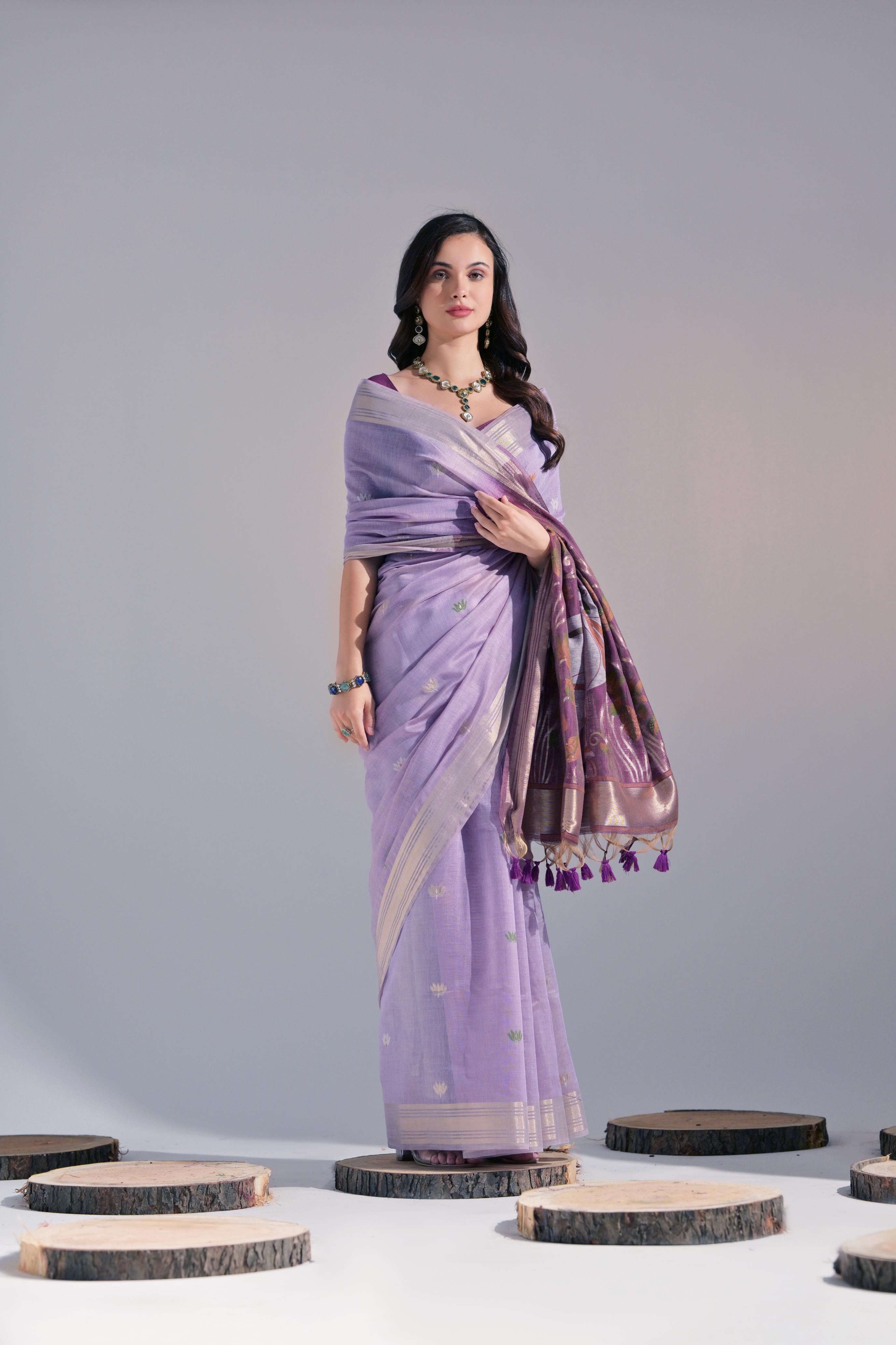Bright-  motifs woven design saree with woven design border muga saree