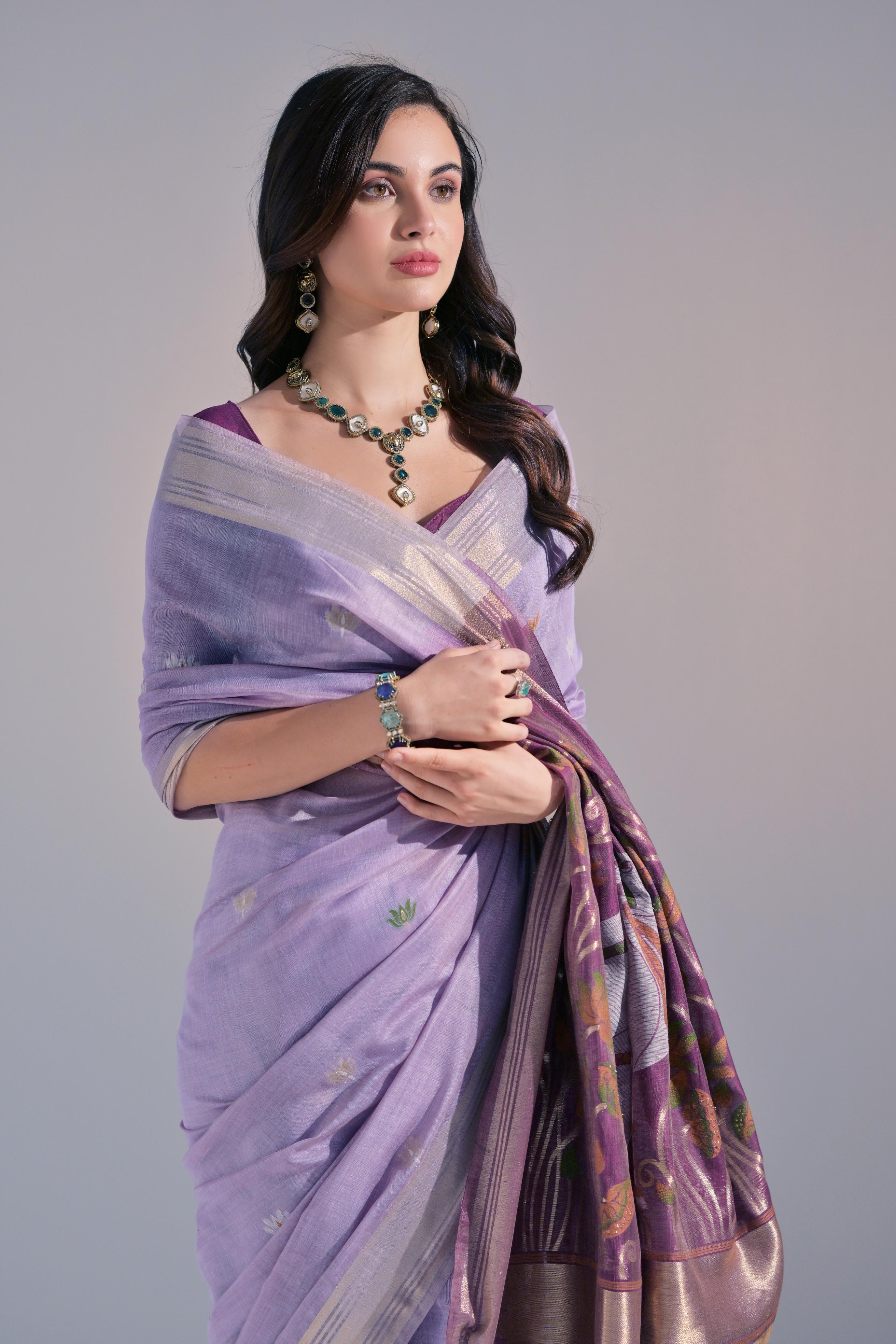 Bright-  motifs woven design saree with woven design border muga saree